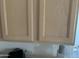 Close-up of kitchen cabinets, countertop, appliance, and other various kitchen items at 12955 E Sahuaro Dr, Scottsdale, AZ 85259