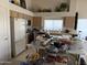 Functional kitchen with ample cabinet space and a window overlooking the backyard at 12955 E Sahuaro Dr, Scottsdale, AZ 85259