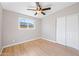 Spare bedroom with a window letting in natural light, and a ceiling fan for a cool breeze at 1307 E Broadmor Dr, Tempe, AZ 85282