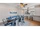Stylish dining area with a modern table set, contemporary art, and access to the kitchen at 1307 E Broadmor Dr, Tempe, AZ 85282