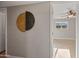 Bright hallway with an attractive art piece on the wall leading to a bedroom with a ceiling fan at 1307 E Broadmor Dr, Tempe, AZ 85282
