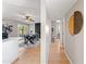 A bright living area with access to the dining and kitchen rooms and hallway at 1307 E Broadmor Dr, Tempe, AZ 85282