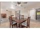 Open-concept dining room with a large wood table and easy access to other living spaces at 15849 N 46Th Pl, Phoenix, AZ 85032