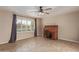 Home office features window with shutters, ceiling fan, and roll top desk at 15849 N 46Th Pl, Phoenix, AZ 85032