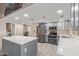 Spacious kitchen featuring modern appliances and a large island, perfect for cooking and gatherings at 15849 N 46Th Pl, Phoenix, AZ 85032