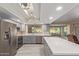 Modern kitchen features stainless steel appliances, sleek countertops, and an island perfect for entertaining at 15849 N 46Th Pl, Phoenix, AZ 85032