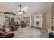 Open-concept living area with vaulted ceilings and direct access to an outdoor patio at 15849 N 46Th Pl, Phoenix, AZ 85032