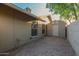 Functional side yard with a storage shed and convenient access, blending practicality with design at 15849 N 46Th Pl, Phoenix, AZ 85032