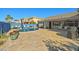 Paver patio leads to the backyard pool offering outdoor living and enjoyment at 16396 W Fillmore St, Goodyear, AZ 85338