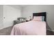 Cozy bedroom with a comfortable chair and a large closet at 16396 W Fillmore St, Goodyear, AZ 85338