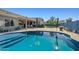 Sparkling pool with turtle mosaic and spacious patio area perfect for outdoor entertaining at 16396 W Fillmore St, Goodyear, AZ 85338