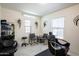 Salon highlighting the hair washing station and waiting area at 16425 W Latham St, Goodyear, AZ 85338