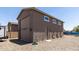 Exterior view of a home with a three-car garage at 18319 W Marshall Ave, Litchfield Park, AZ 85340