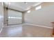 Spacious garage features a large overhead door, bright lighting, and smooth flooring at 18319 W Marshall Ave, Litchfield Park, AZ 85340