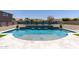 Backyard pool with water feature, surrounded by stone pavers at 18319 W Marshall Ave, Litchfield Park, AZ 85340