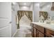 Well-maintained bathroom featuring a shower/tub combo and vanity at 189 N Rainbow Way, Casa Grande, AZ 85194