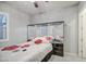 Comfortable bedroom with a mirrored headboard and bright natural light at 189 N Rainbow Way, Casa Grande, AZ 85194