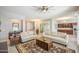 Spacious living room with neutral tones, comfortable seating, and an open layout to the kitchen at 189 N Rainbow Way, Casa Grande, AZ 85194