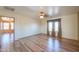 This expansive living room is bathed in natural light from several windows at 19321 N Tara Lane Ln, Maricopa, AZ 85138