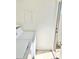 A bright laundry area features a washer and dryer unit and tile flooring and access to the outside at 19601 N 7Th St Ave # 1036, Phoenix, AZ 85024