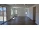 Bright and open living room with wood flooring, recessed lighting and plenty of natural light at 20645 N 226Th Ln, Surprise, AZ 85387