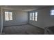 Spacious loft with plush carpet, natural light and picturesque backyard views from several large windows at 20645 N 226Th Ln, Surprise, AZ 85387