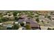 Expansive aerial view showcasing the backyard pool, and multiple outdoor buildings at 21131 E Excelsior Ave, Queen Creek, AZ 85142