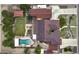 Overhead view of an estate featuring a lush lawn, sparkling pool and RV parking at 21131 E Excelsior Ave, Queen Creek, AZ 85142