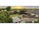 Beautiful backyard with pool, lounge area, grassy space and covered pavilion at 21131 E Excelsior Ave, Queen Creek, AZ 85142