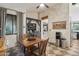 Cozy breakfast nook features a chalkboard wall, coffee bar, and views into the main living area at 21131 E Excelsior Ave, Queen Creek, AZ 85142