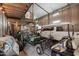 Spacious garage with a truck, dune buggy and golf cart, offering plenty of space at 21131 E Excelsior Ave, Queen Creek, AZ 85142
