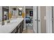 Bathroom vanity area, looking into the connected bedroom with a coordinated design at 2148 W Angelo Way, San Tan Valley, AZ 85144