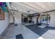 Spacious three car garage with epoxy floors, custom lighting and organization at 2148 W Angelo Way, San Tan Valley, AZ 85144