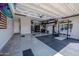 Spacious three car garage with epoxy floors, custom lighting and organization at 2148 W Angelo Way, San Tan Valley, AZ 85144
