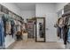 This walk-in closet features custom shelving and ample storage space for an organized wardrobe at 2148 W Angelo Way, San Tan Valley, AZ 85144