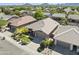 Charming single-Gathering home features well-manicured landscaping, inviting curb appeal, and a two-car garage at 21539 N 72Nd Pl, Scottsdale, AZ 85255