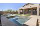 Enjoy a sparkling pool with stone coping, surrounded by lush landscaping and a spacious patio at 21539 N 72Nd Pl, Scottsdale, AZ 85255