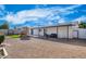 Backyard with patio, artificial grass, patio furniture and a playhouse at 2313 N 66Th St, Scottsdale, AZ 85257