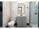 Bathroom with a modern vanity, toilet, and tiled shower at 2313 N 66Th St, Scottsdale, AZ 85257
