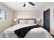 Bright bedroom featuring a comfortable bed with nightstands and lamps at 2313 N 66Th St, Scottsdale, AZ 85257
