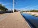 Picturesque community path beside a canal and mountain views at 2313 N 66Th St, Scottsdale, AZ 85257