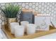 Close up of the decor on the counter with coffee cup, coffee beans, coffee pots and plant at 2313 N 66Th St, Scottsdale, AZ 85257