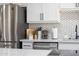 Bright kitchen with stainless steel appliances and modern white countertops at 2313 N 66Th St, Scottsdale, AZ 85257