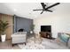 Spacious living room with fireplace, modern furniture, and stylish decor at 2313 N 66Th St, Scottsdale, AZ 85257