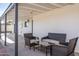 Covered patio features outdoor seating furniture at 2313 N 66Th St, Scottsdale, AZ 85257