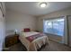 Neutral bedroom featuring a single bed, side table and good natural light at 2955 E Hermosa Vista Dr, Mesa, AZ 85213