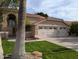 Beautiful home boasting a large garage, well-manicured lawn, and an attractive red tile roof at 2955 E Hermosa Vista Dr, Mesa, AZ 85213