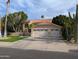 Lovely home featuring a large two-car garage, desert landscaping, and a red tile roof at 2955 E Hermosa Vista Dr, Mesa, AZ 85213