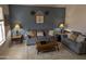 Comfortable living room with a sofa, loveseat, lamps, and a neutral color scheme at 2955 E Hermosa Vista Dr, Mesa, AZ 85213