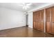 Bedroom featuring a closet and access to another room at 3247 E Sheridan St, Phoenix, AZ 85008
